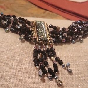 Black and Gold Beaded Necklace with Intricate Centerpiece